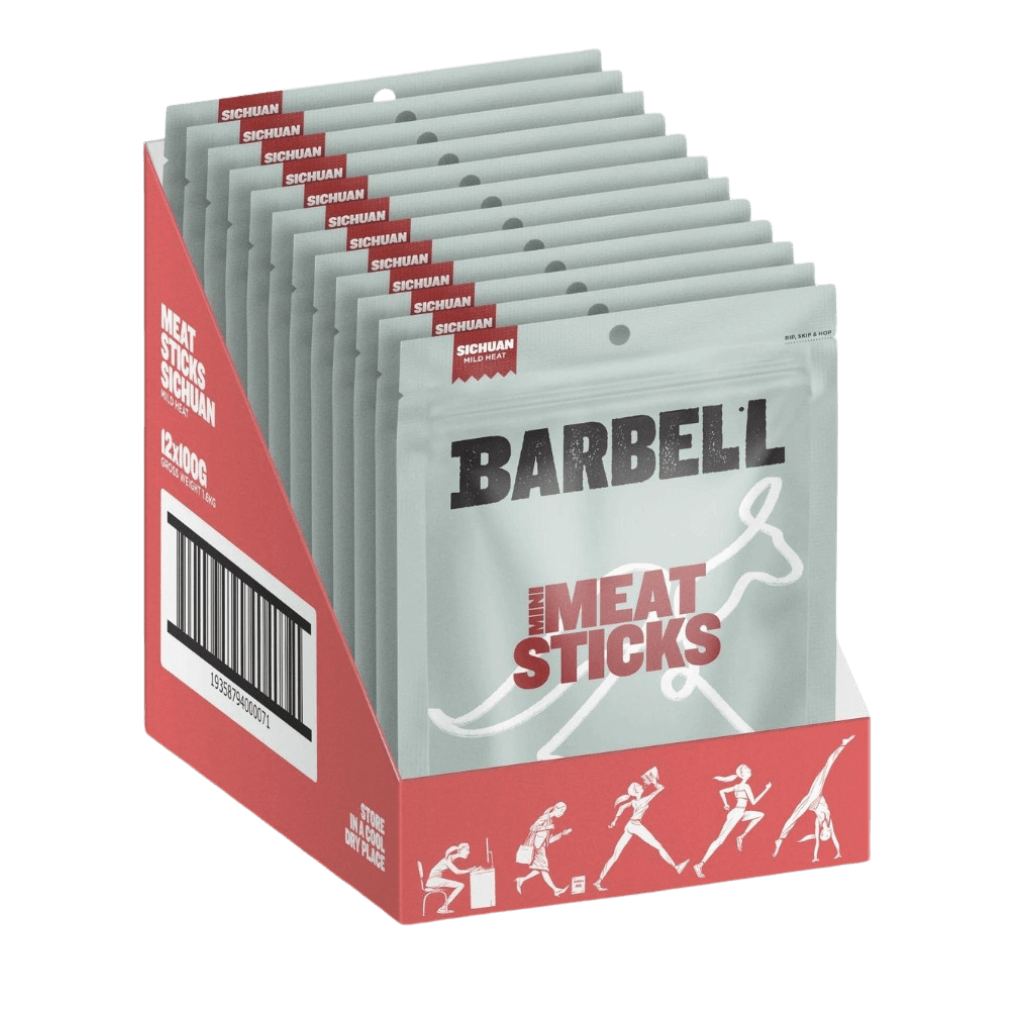 A hand holding a meat stick, perfect for a quick protein boost during workouts.