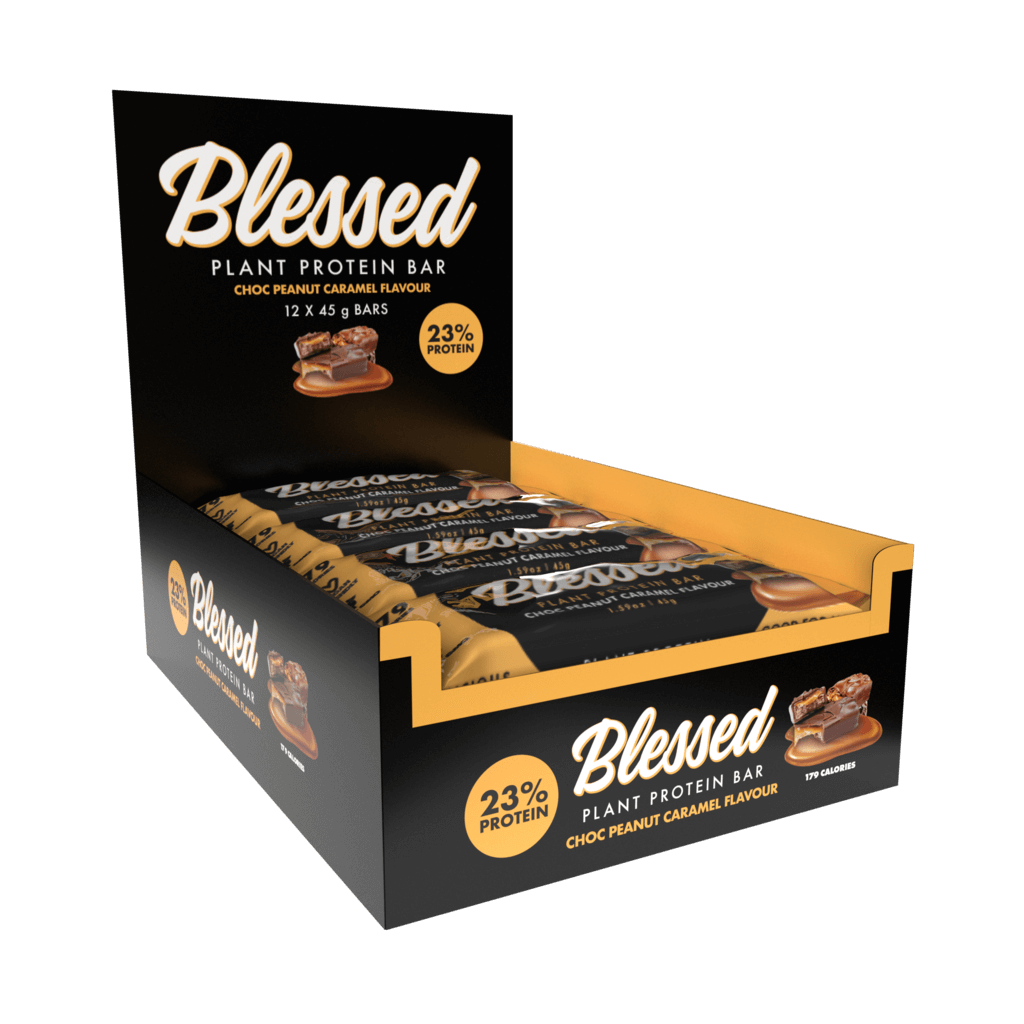 Fitness enthusiast enjoying a Blessed Vegan Protein Bar post-workout, highlighting its role as a healthy snack.