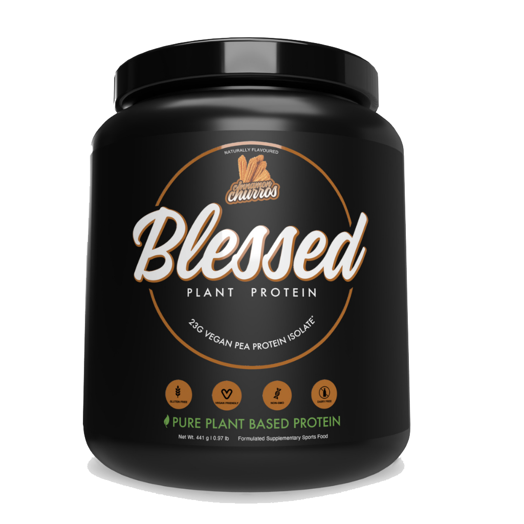 Close-up of Blessed Plant Protein scoop with fresh fruits, highlighting natural plant-based ingredients