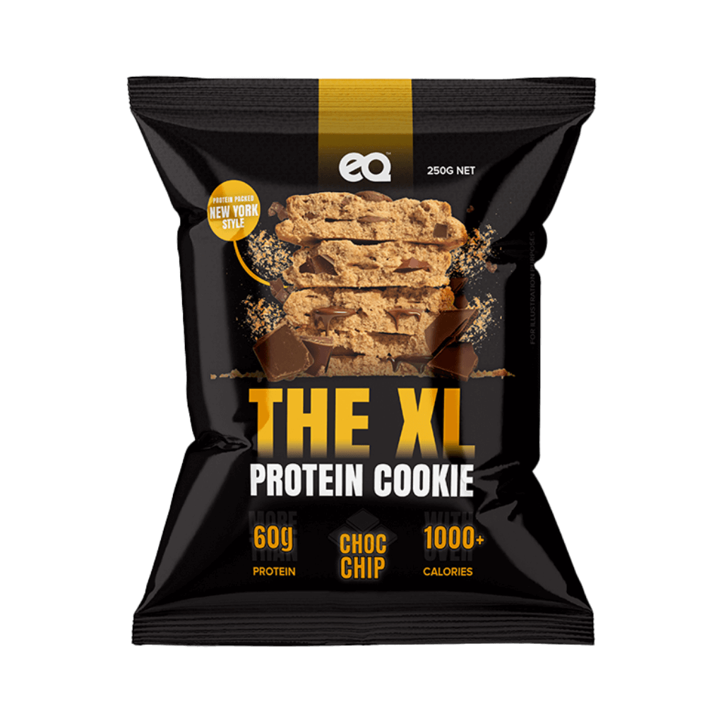 PowerFuel 1000 Cal Protein Cookie displayed on a wooden table, showcasing its delicious texture and ingredients.