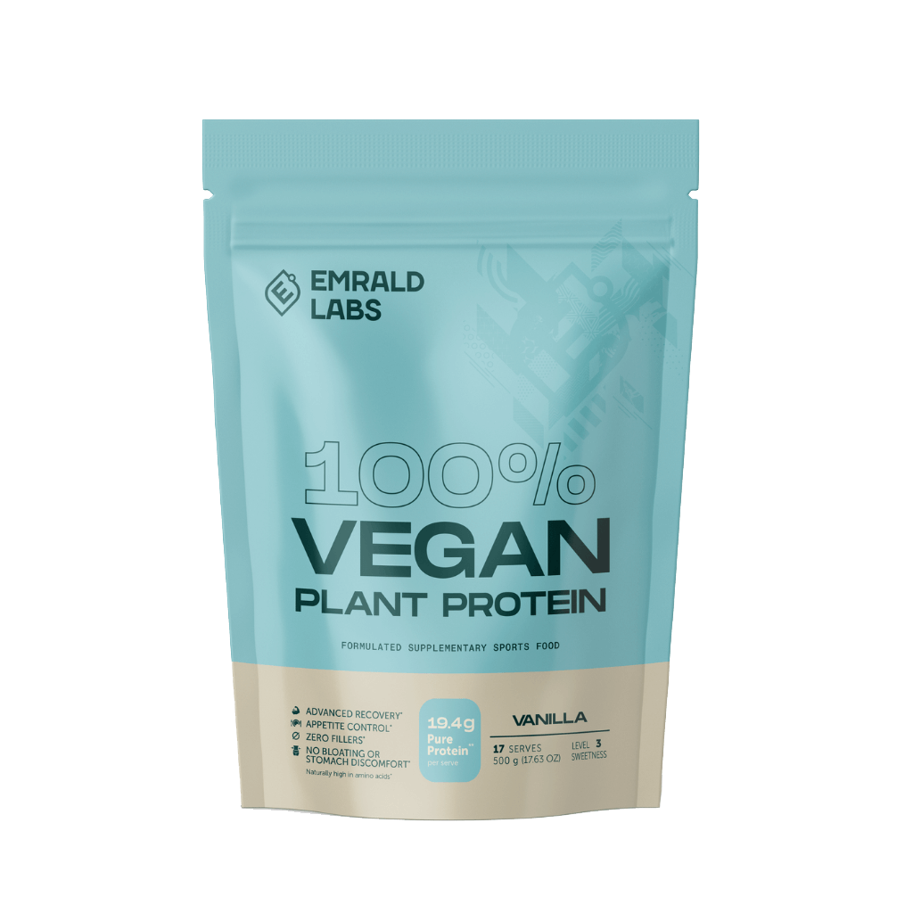 Scoop of vegan protein powder shown in natural light with a fruit backdrop.