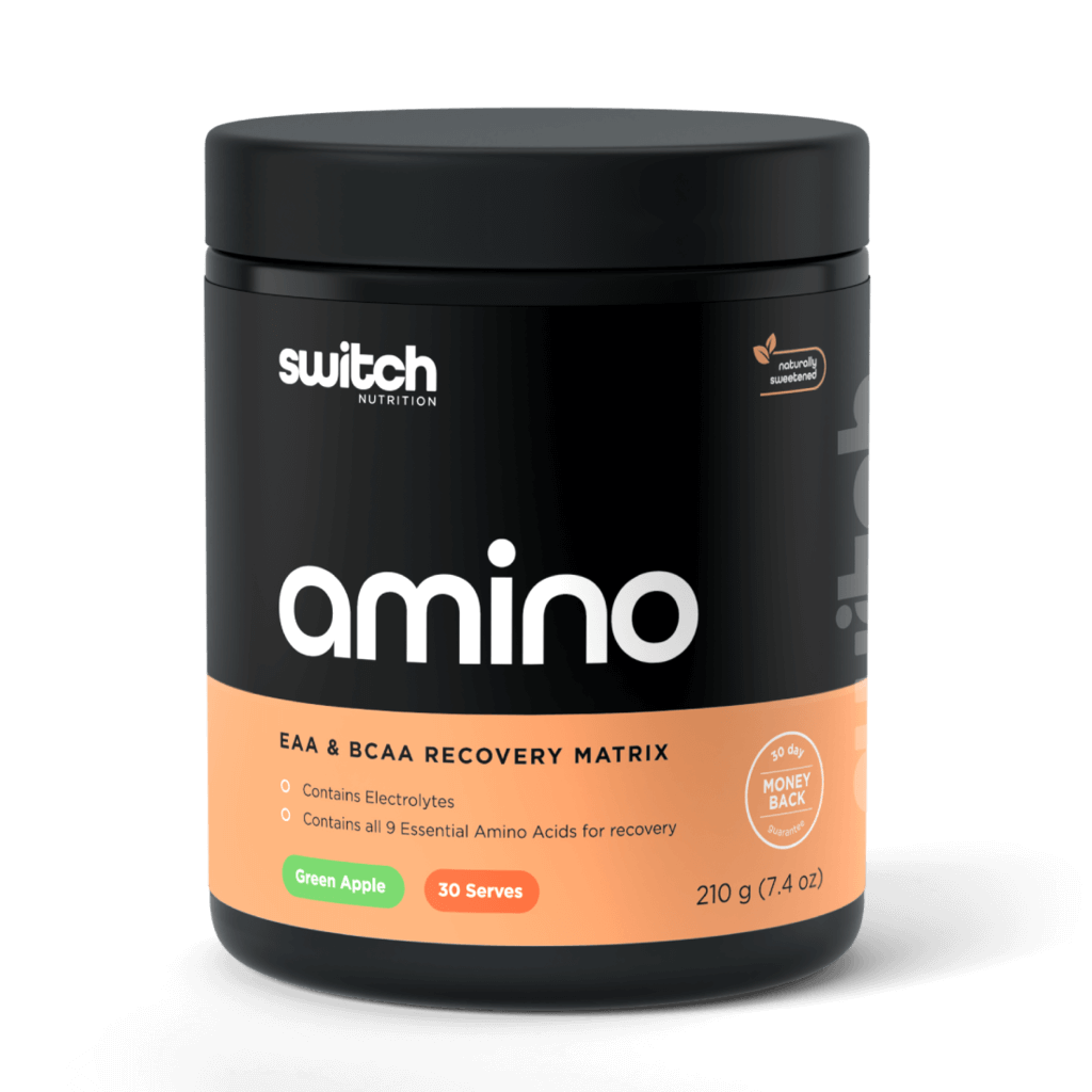 Front view of Amino Boost container placed next to gym gear showing natural amino acids label