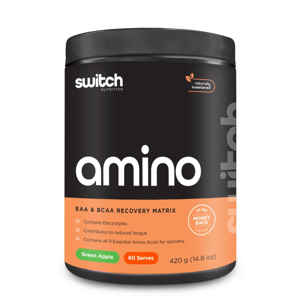 Scoop of powder being mixed in water, ideal for fast post-workout muscle recovery
