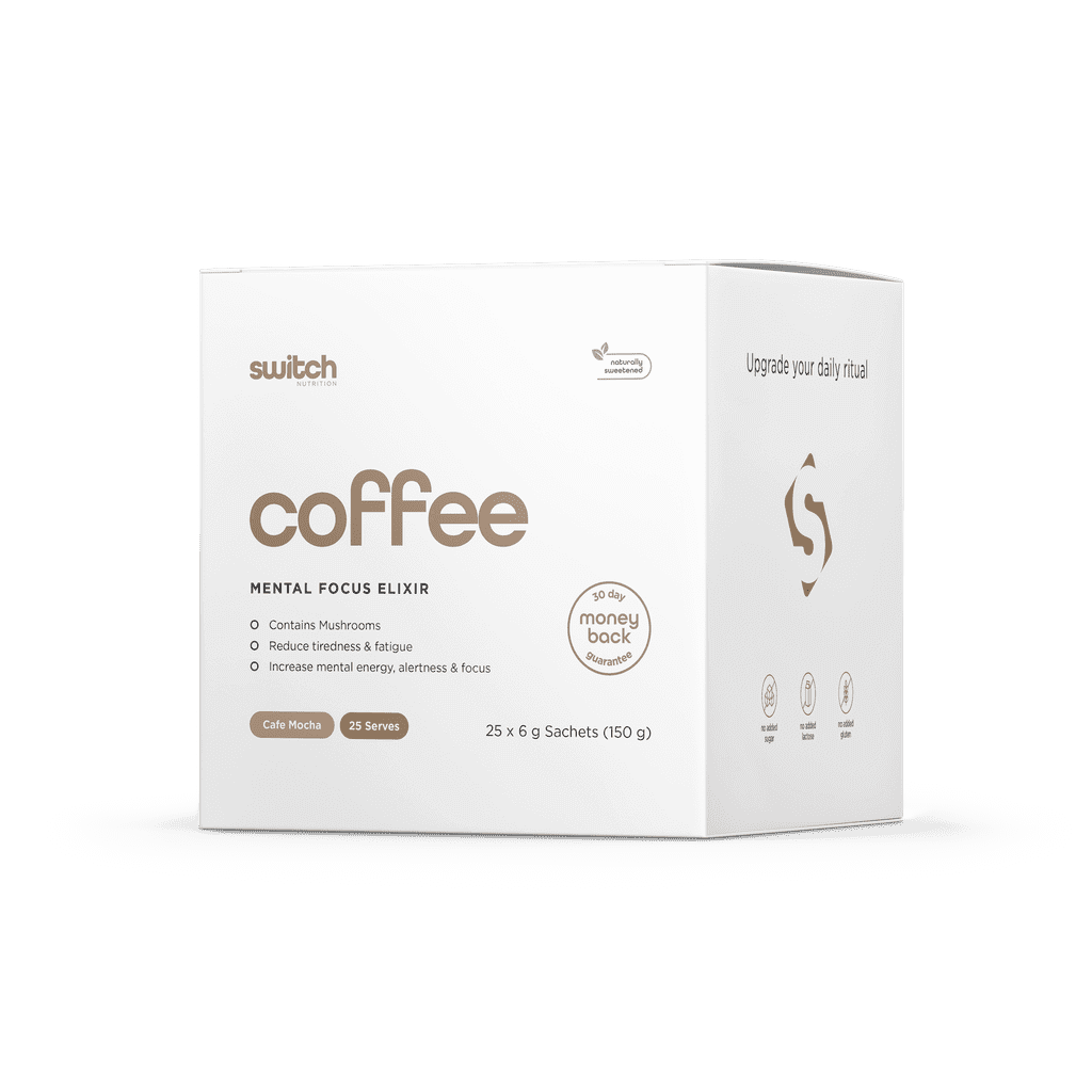 An active lifestyle shot featuring a person enjoying FocusBoost Coffee Mix while working at a laptop, highlighting productivity.