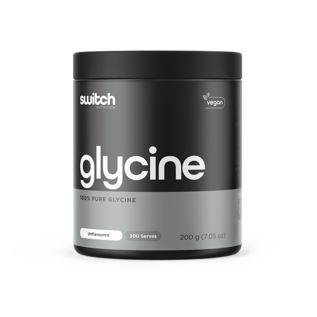 Close-up of pure glycine powder in a glass jar, highlighting quality and purity