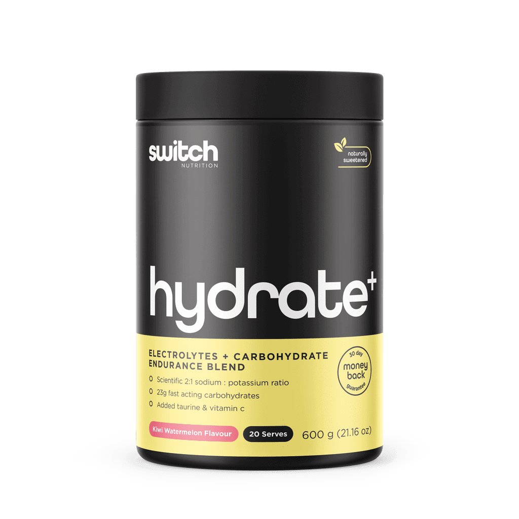 Close-up of the Electrolyte Boost Energy Mix powder in a scoop, showcasing its texture.