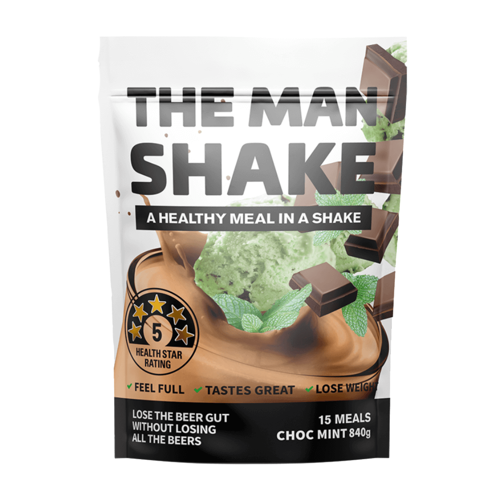 A man blending The Man Shake with milk in a shaker bottle, showcasing quick meal replacement options