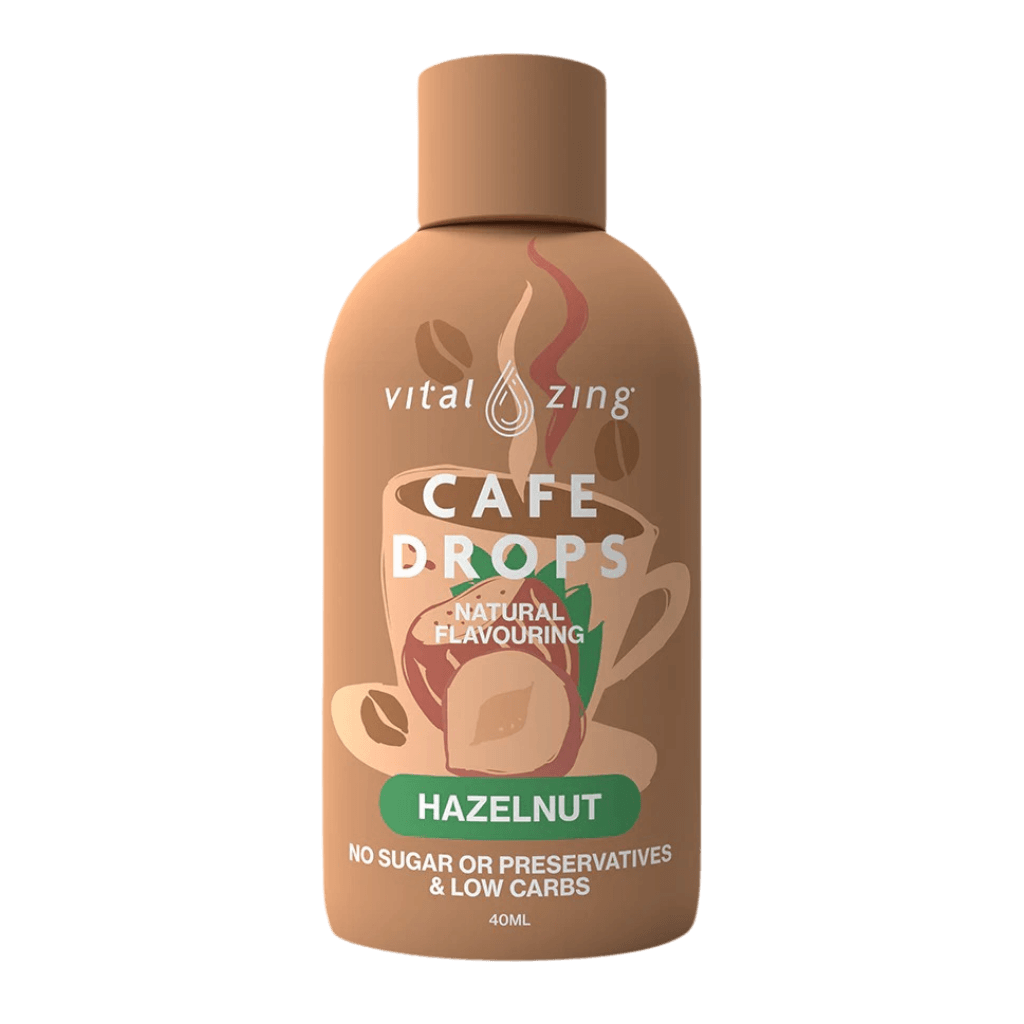 Barista adding flavoring drops to a freshly brewed coffee