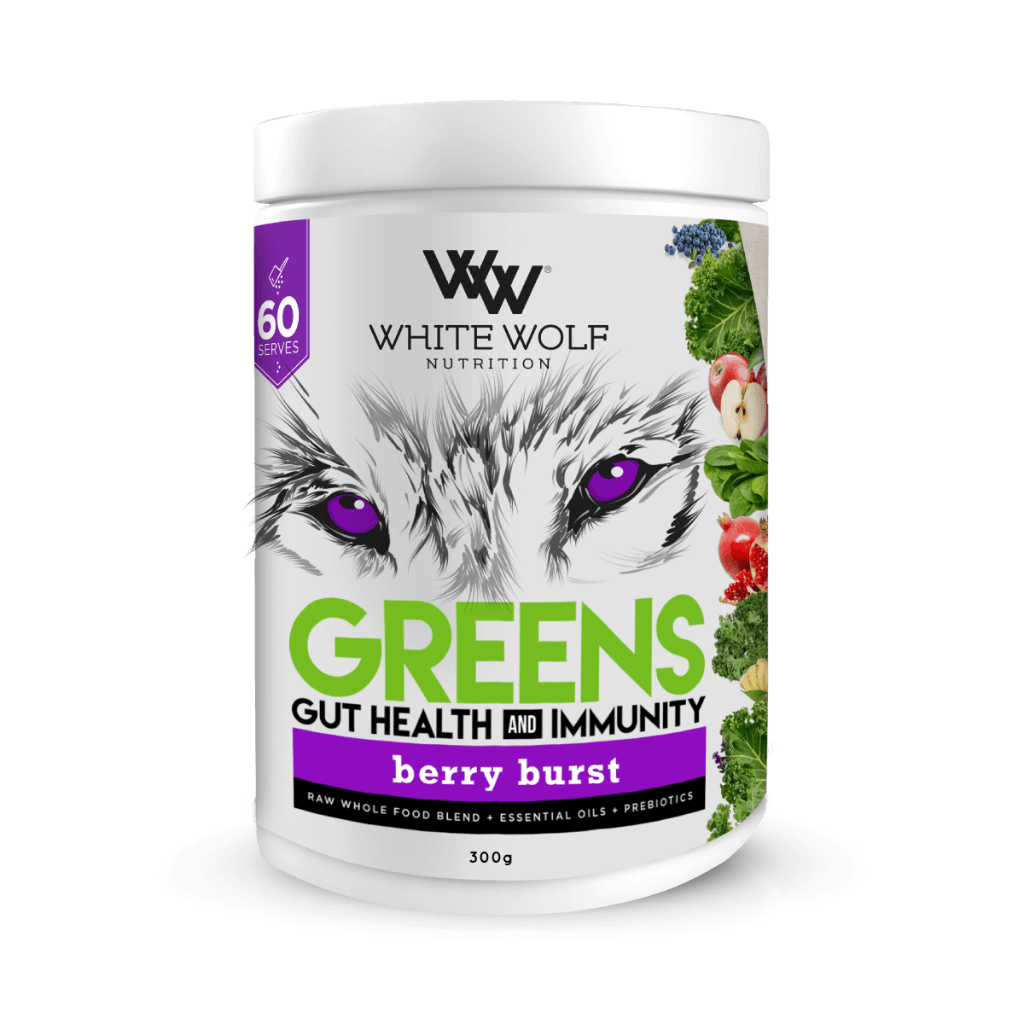 Athletic woman preparing a smoothie with Vitality Greens Superfood Blend, highlighting its use for energy.